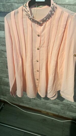 Roze blouse met leuke stuts