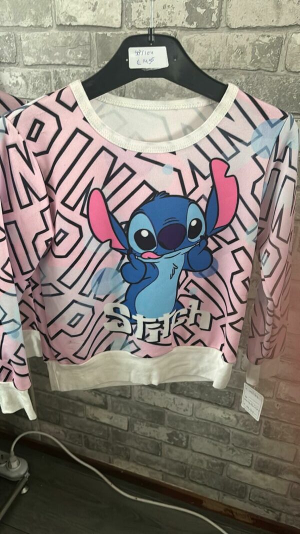 Roze stitch trui